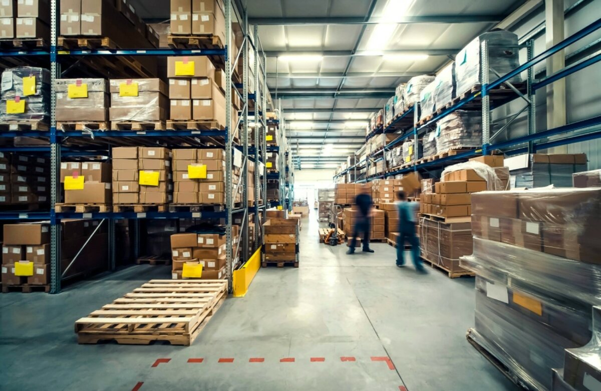 stock-photo-warehouse-interior-with-shelves-pallets-and-boxes-1019498926-transformed-1200x781.jpeg